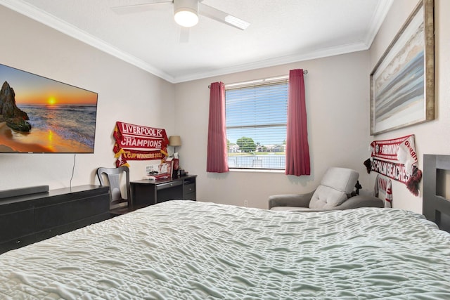 bedroom featuring ceiling fan and crown molding