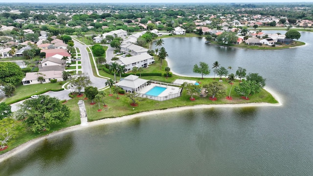 bird's eye view with a residential view and a water view