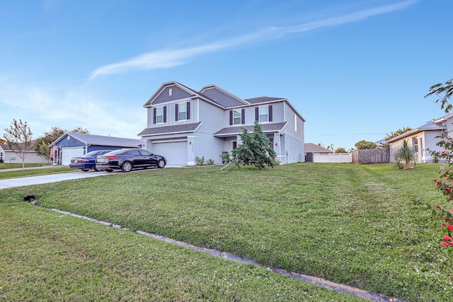 view of front of property featuring a garage and a front lawn