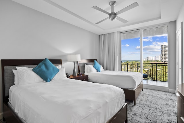 bedroom with ceiling fan and access to exterior