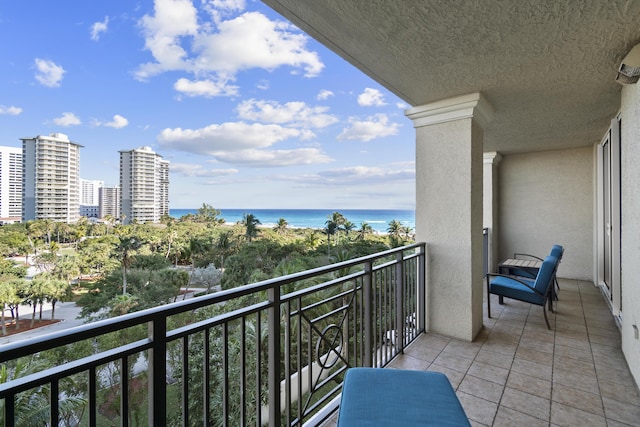 balcony featuring a water view