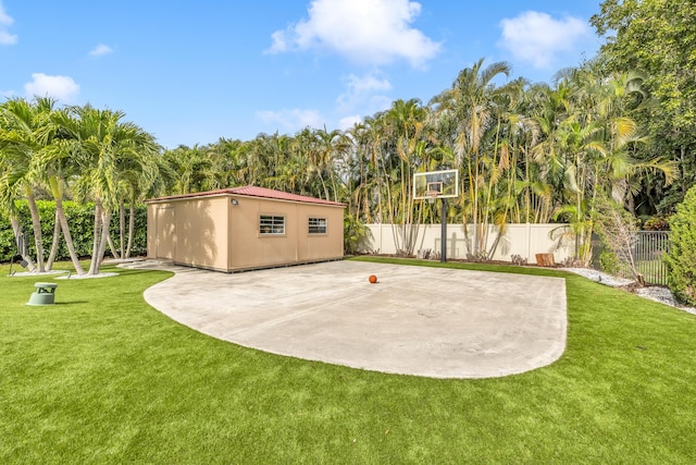 rear view of house with a patio area, a tiled roof, an outdoor pool, and stucco siding