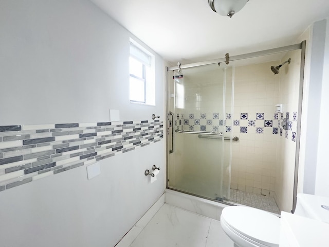 bathroom featuring toilet, tile walls, and walk in shower