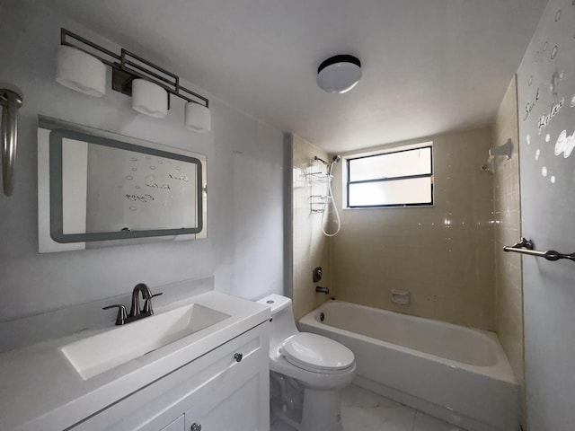 full bathroom featuring vanity, toilet, and tiled shower / bath