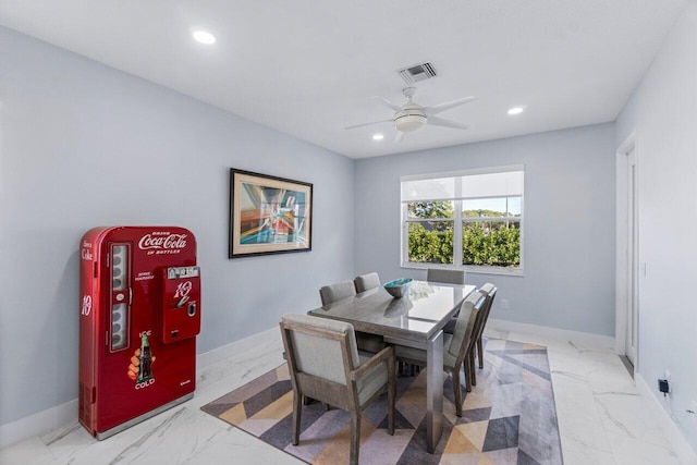 dining room featuring ceiling fan