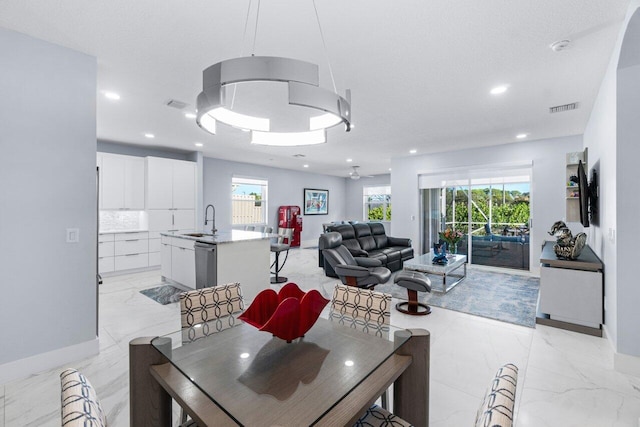 dining room featuring sink