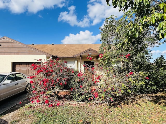 view of front of home with a garage