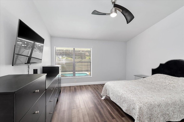 bedroom featuring ceiling fan and dark wood-type flooring