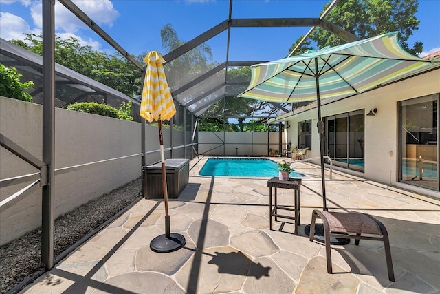 view of pool featuring a patio and a lanai