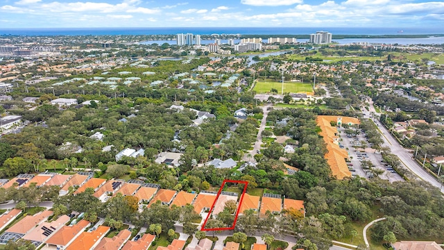 drone / aerial view with a water view