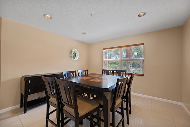 dining room featuring light tile patterned flooring