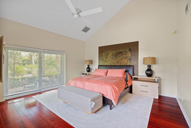 bedroom with ceiling fan, dark hardwood / wood-style flooring, and high vaulted ceiling