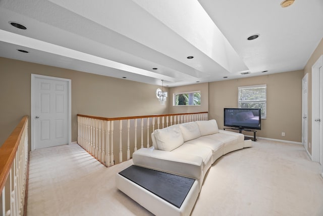 living area with light colored carpet