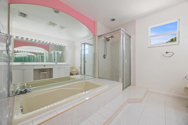 full bathroom with tile patterned floors, vanity, toilet, and shower with separate bathtub