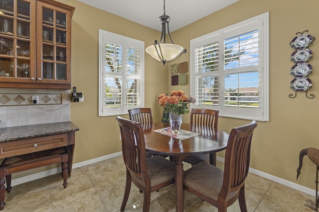 view of tiled dining space