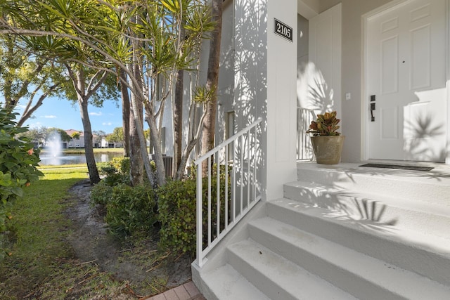 property entrance with a water view