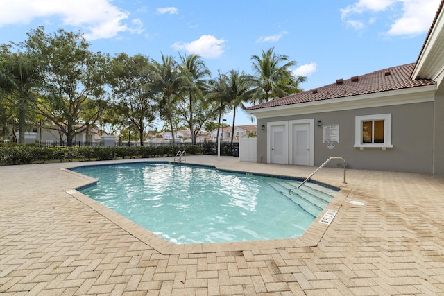 view of pool featuring a patio area