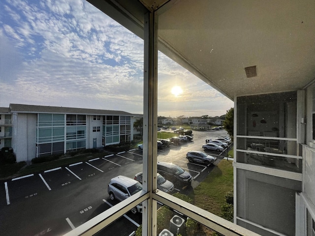 view of balcony at dusk