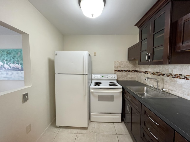 kitchen with white appliances, tasteful backsplash, sink, light tile patterned floors, and dark brown cabinets