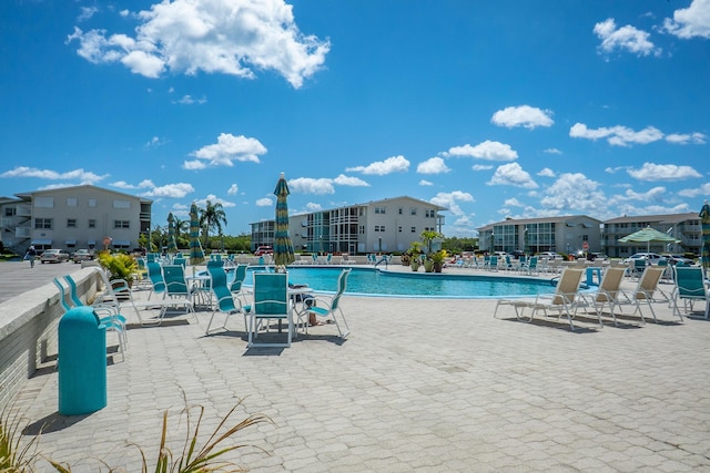 view of pool featuring a patio