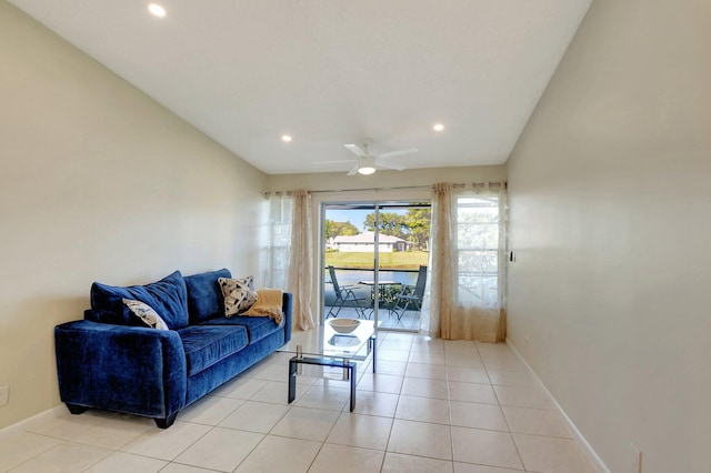 living room with light tile patterned floors and ceiling fan