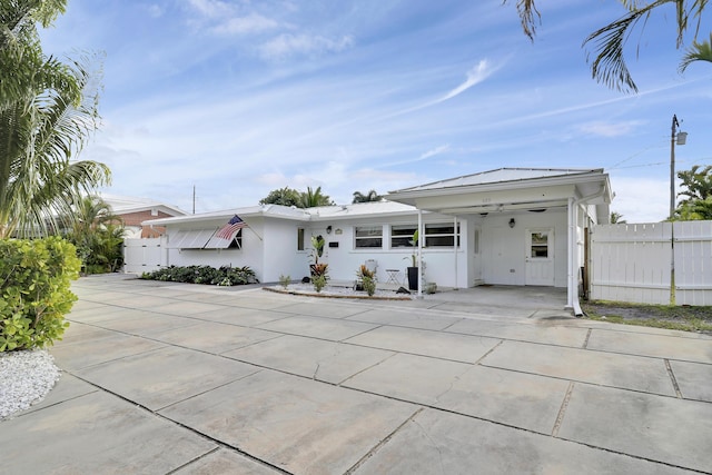 view of front facade featuring a carport