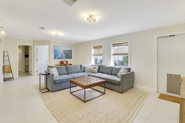 living room with light tile patterned floors