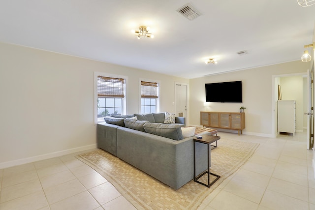 living room with light tile patterned flooring