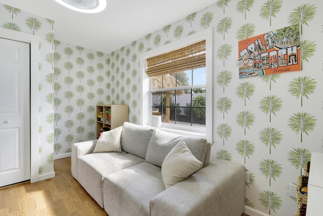 sitting room featuring light hardwood / wood-style floors