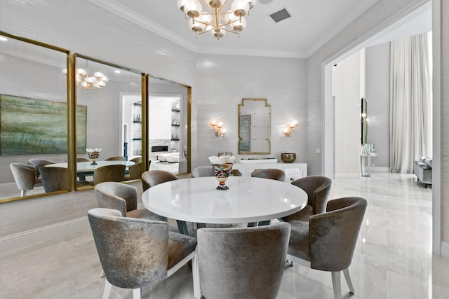 dining space featuring a notable chandelier and crown molding