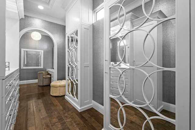 bathroom featuring hardwood / wood-style flooring and ornamental molding