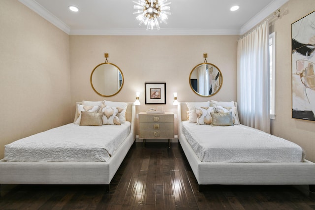 bedroom featuring ornamental molding, dark hardwood / wood-style flooring, and a notable chandelier