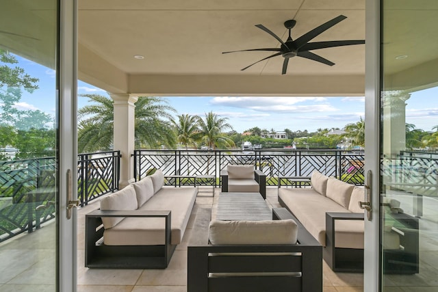 view of patio / terrace featuring ceiling fan, an outdoor hangout area, and a balcony