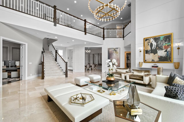 living room featuring a high ceiling and a notable chandelier