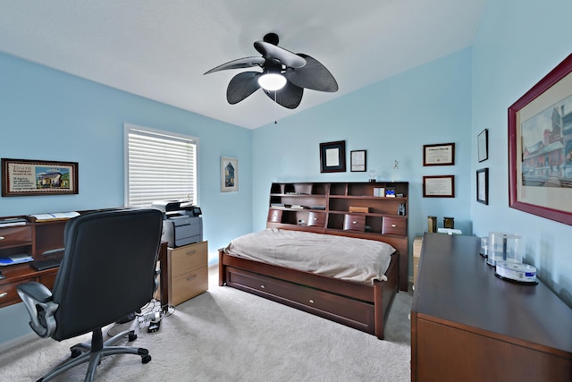 carpeted bedroom with ceiling fan and lofted ceiling