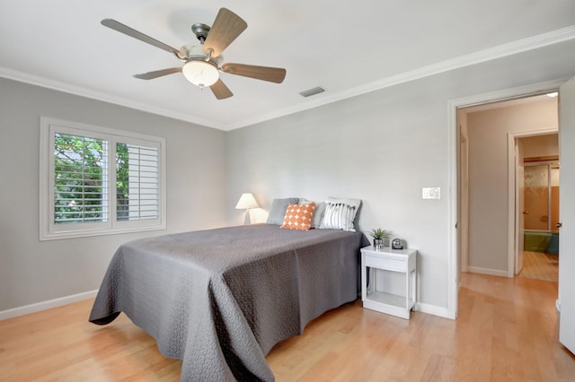 bedroom with light wood-type flooring, ceiling fan, and crown molding