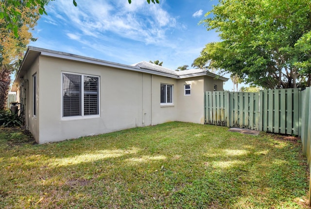 exterior space with a lawn