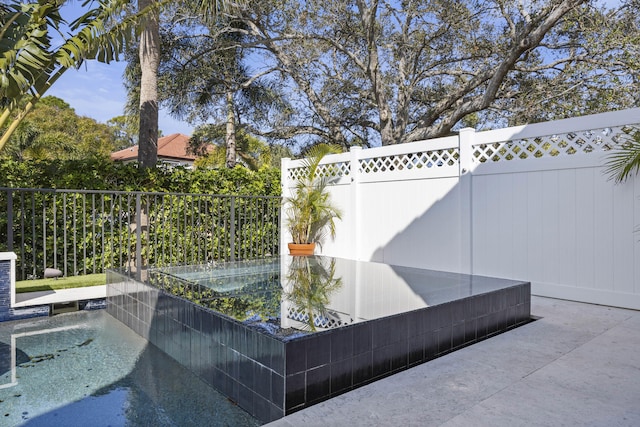 view of patio / terrace with a swimming pool