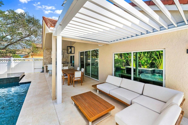 view of patio / terrace with an outdoor living space and a fenced in pool