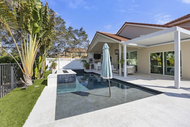 view of pool featuring a patio