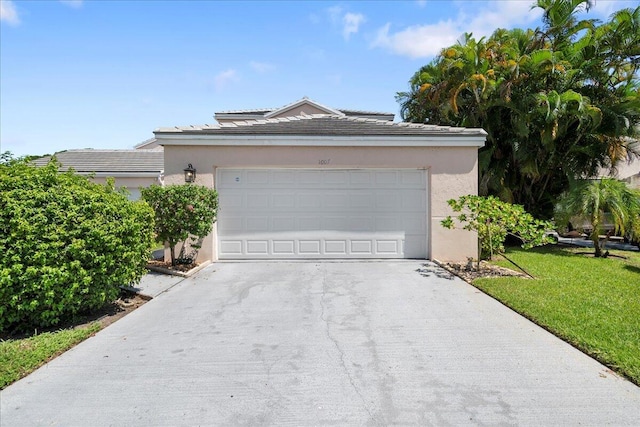 garage featuring a yard