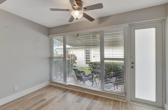 unfurnished room featuring ceiling fan and light hardwood / wood-style floors