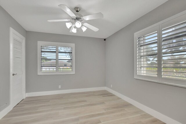 unfurnished bedroom with a closet, ceiling fan, and light hardwood / wood-style floors