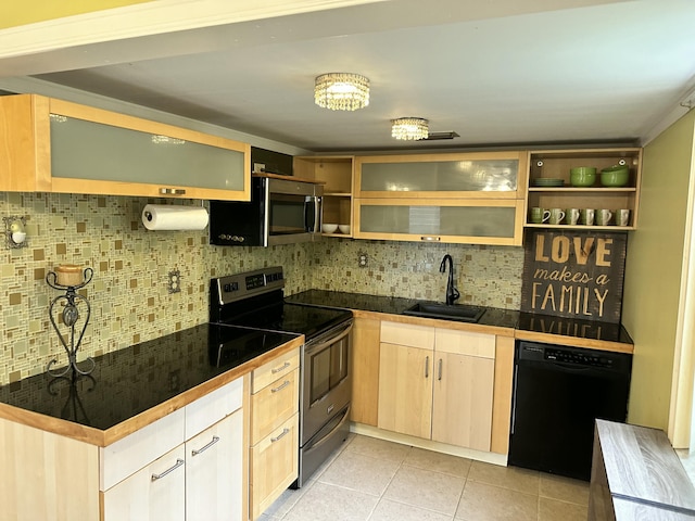 kitchen featuring light brown cabinetry, tasteful backsplash, stainless steel appliances, sink, and light tile patterned floors