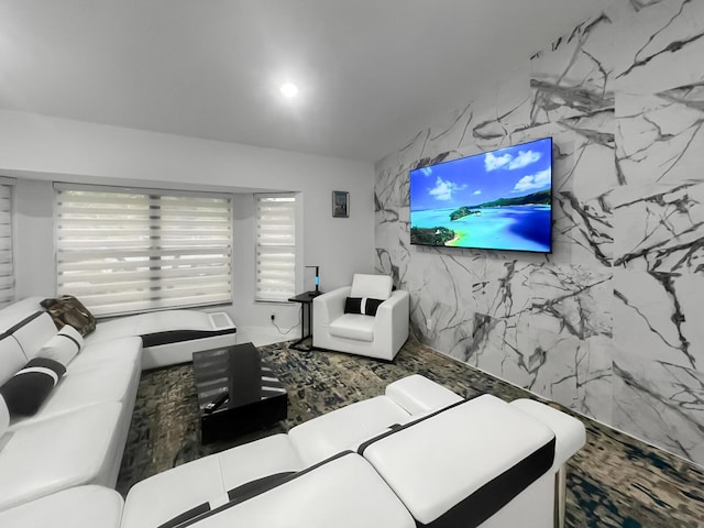 living room featuring tile walls