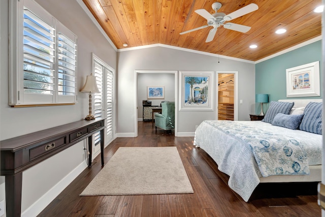 bedroom with vaulted ceiling, a spacious closet, wood ceiling, ceiling fan, and a closet