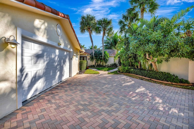 view of patio with a garage