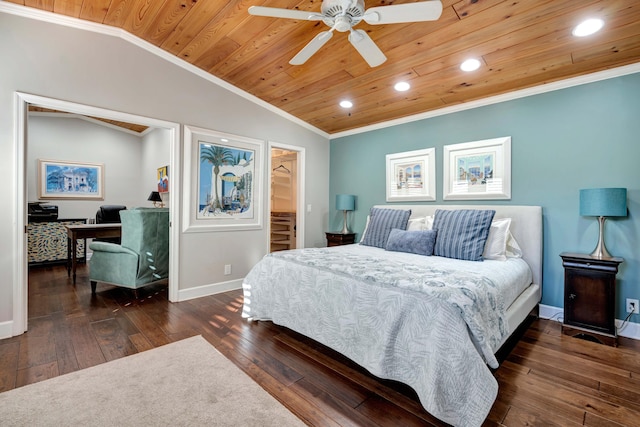 bedroom featuring wood ceiling, a spacious closet, vaulted ceiling, dark hardwood / wood-style flooring, and ceiling fan