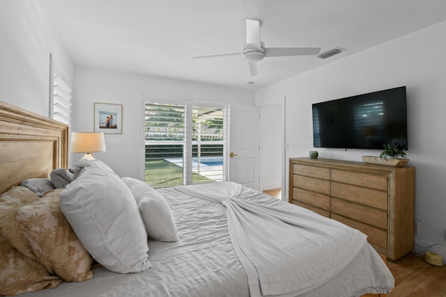 bedroom with ceiling fan and light hardwood / wood-style floors