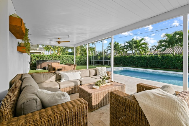 exterior space featuring ceiling fan